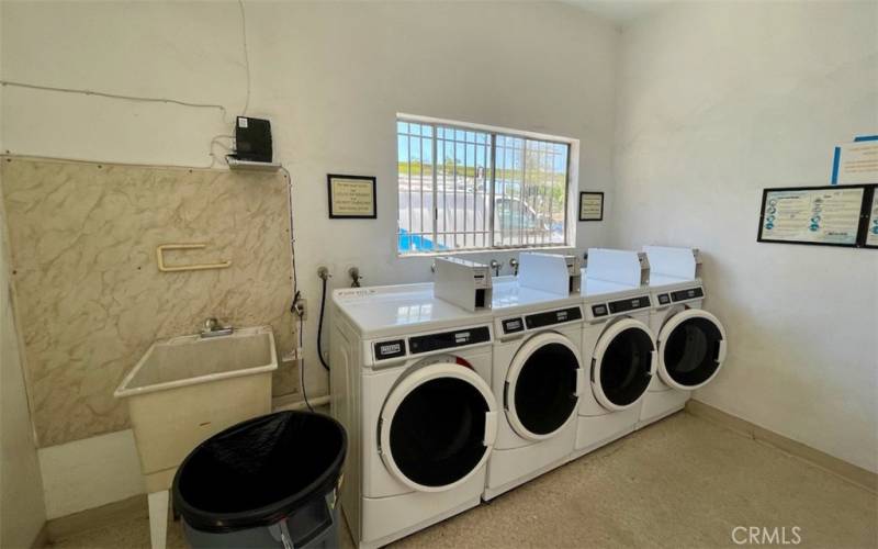 Secure onsite laundry facility with plenty of washers and dryers.