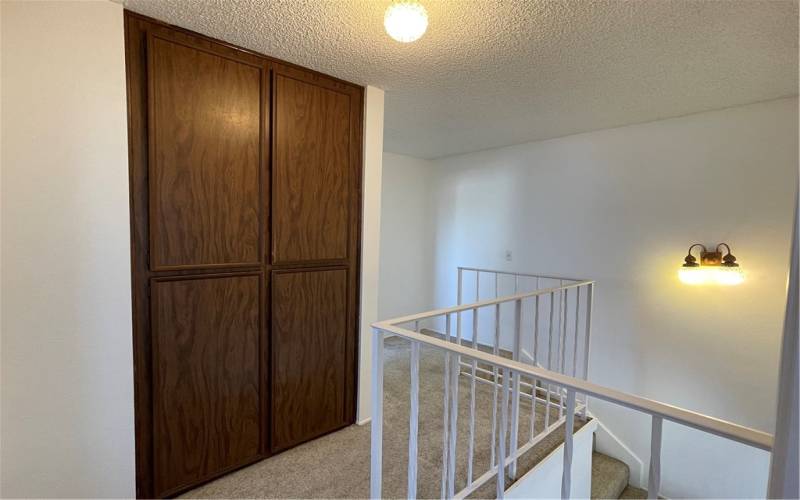 A linen closet and bathroom seperate the two upstairs bedrooms. Giving each room privacy.