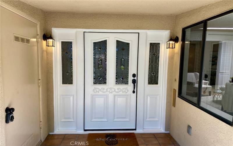 walk-in storage room on left side of porch