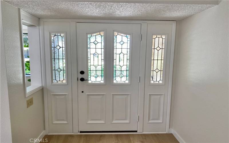 beautiful front door and sidelights