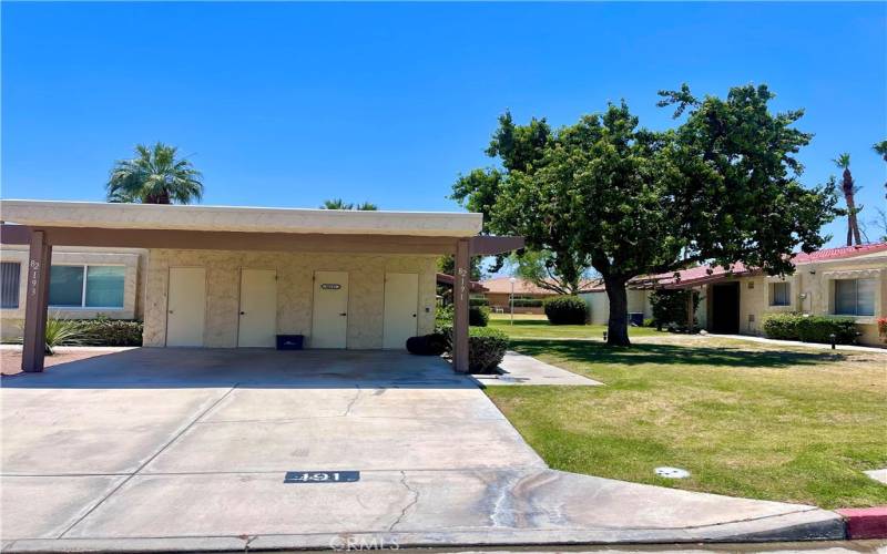 1 Car Carport & 1 car parking space, 2 storage rooms.