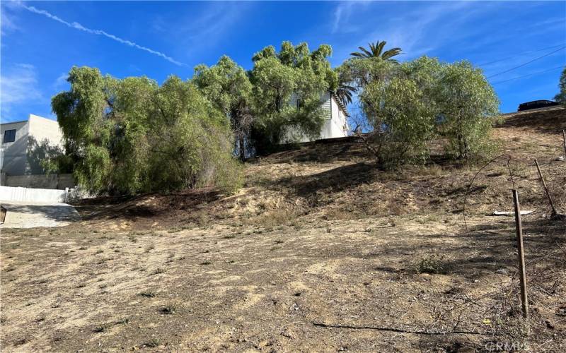 westerly view of the back of 11288 C San Juan, St. Loma Linda, from 11300 San Mateo Dr.