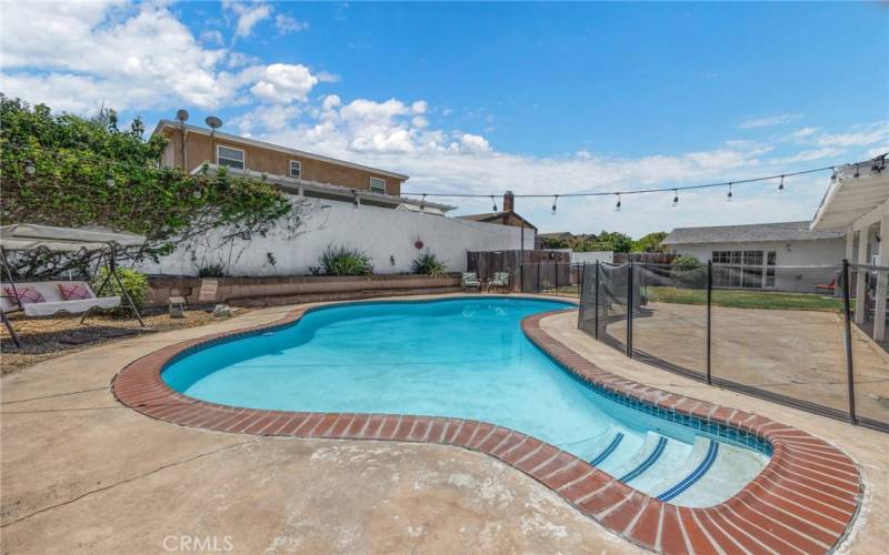 Amazing pool with pool fence.