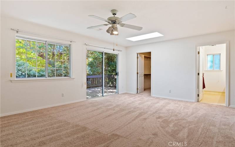 Primary bedroom with access to back deck