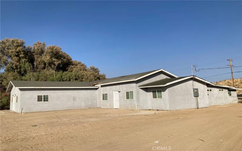 Front and west side of Units 1 & 2.  Each unit has 4 bedrooms & 2 bathrooms.