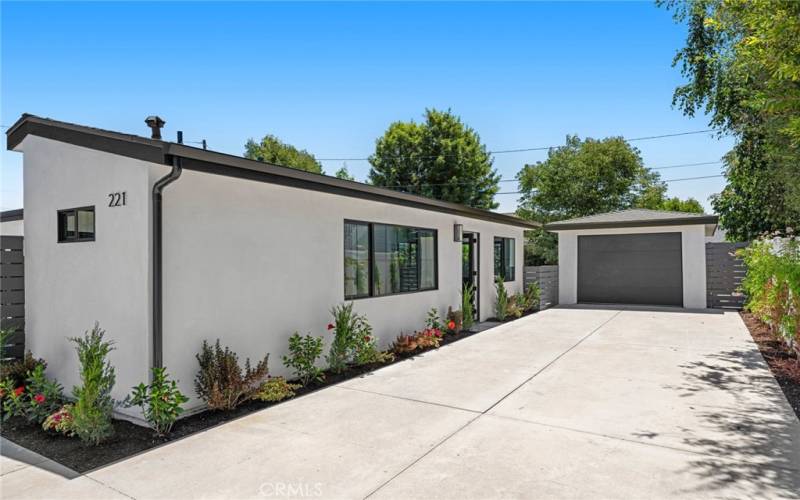 Back house driveway and 1-car garage