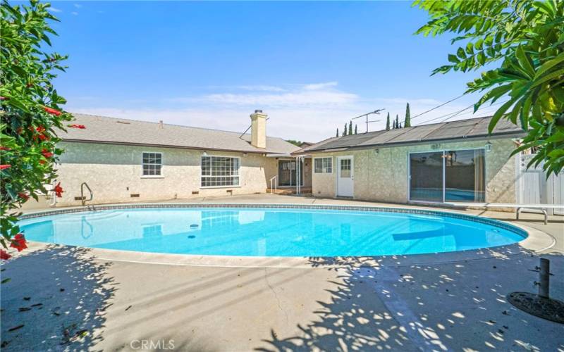 Pool & Rear View Of House