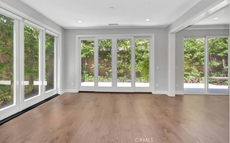 Flex Space Bathed in Natural Light - Dining Room, Atrium with upgraded sliders to private patio