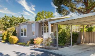 Side-By-Side Covered Carport, one side extra long.