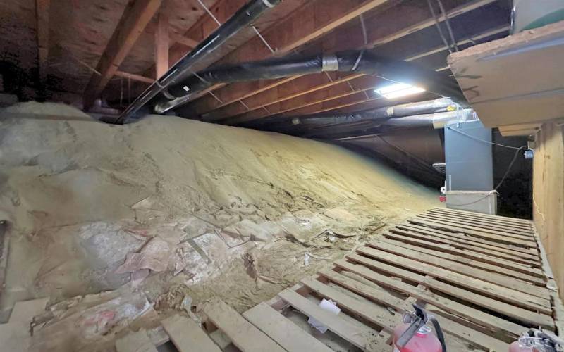 Crawlspace behind garage