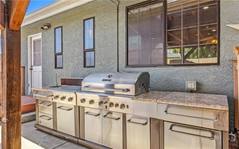 with an outside gourmet propane kitchen!