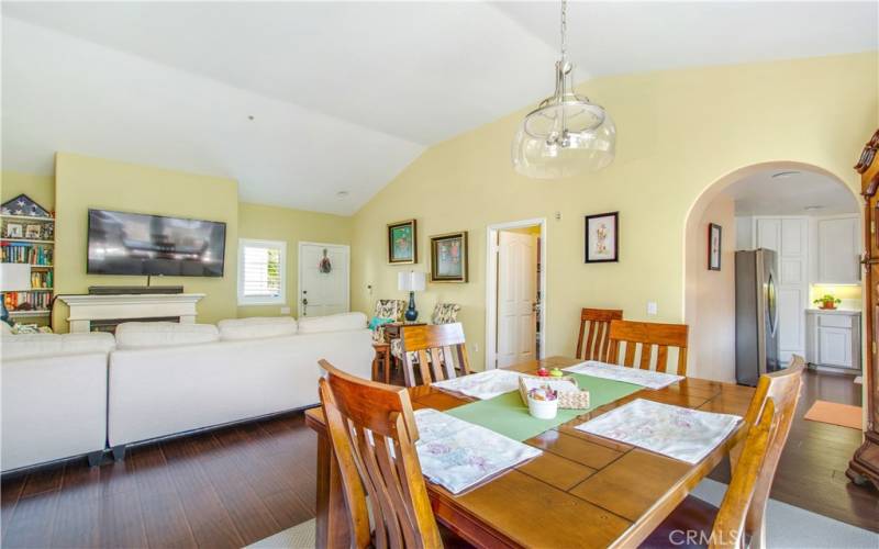 Dining area leading into living room, second bedroom and kitchen.