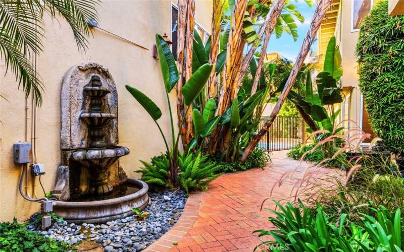 A beautiful fountain adding charm and elegance to the entrance of the compound.