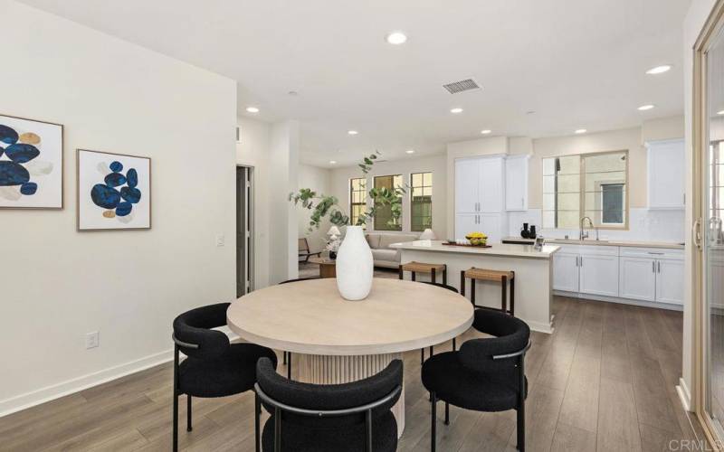 Dining area with a view into the family room