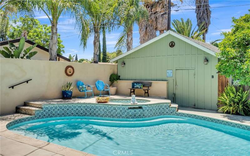 Private backyard with replastered pool, and spa with waterfall.