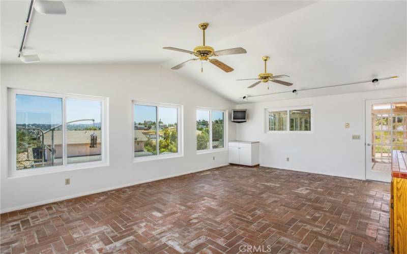 Large family room with ceiling fans