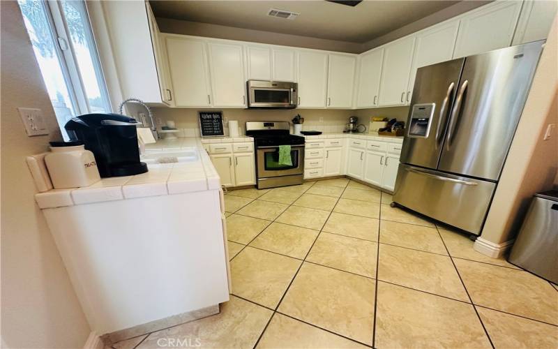 Kitchen with freshly painted cabinets