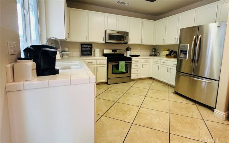 Kitchen with freshly painted cabinets