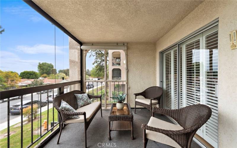 The large covered balcony is the perfect spot to enjoy your morning coffee or unwind with a glass of wine while enjoying the spectacular scenery.