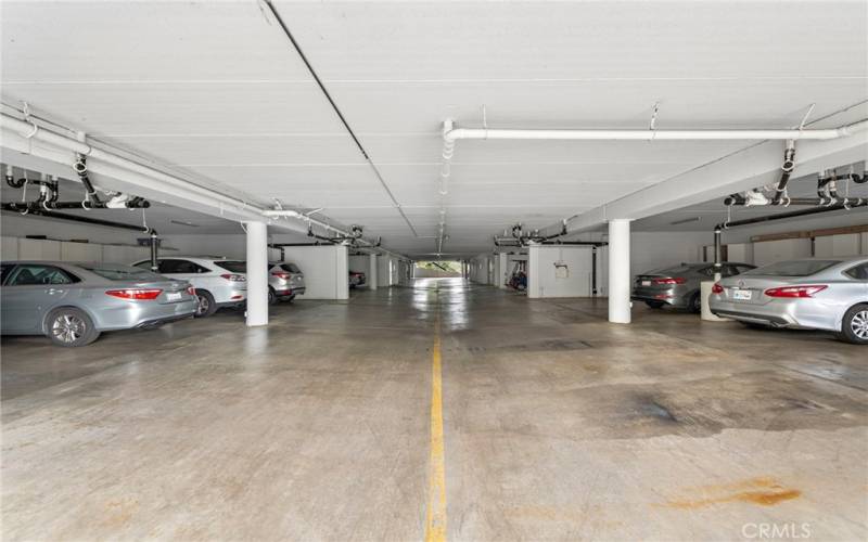 An underground garage protects your car from the elements and features oversized parking spaces and plenty of storage cabinets.