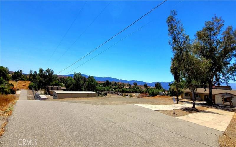 Front of home looking south down Penney Pl. towards Hyatt Rd. *Hyatt is paved