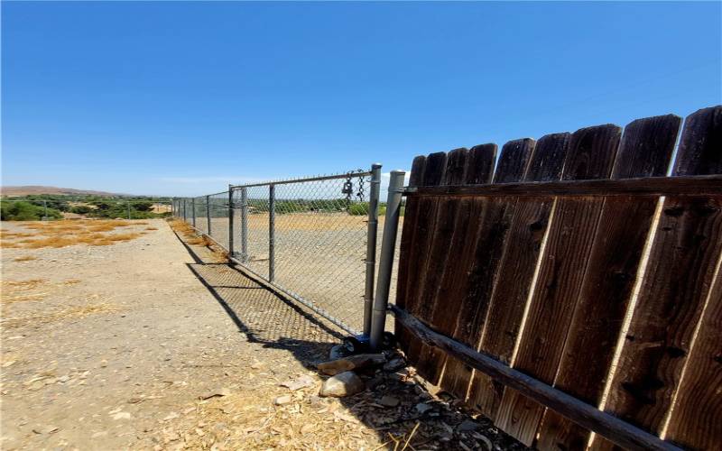 Gated Drive in entry for horse area or gated parking area.