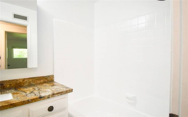 Main Bathroom w/ re-glazed Shower-Tub