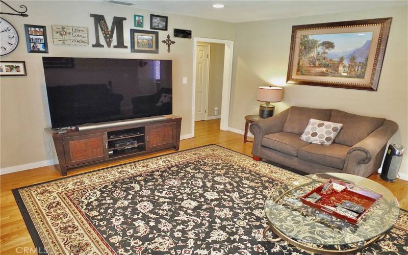 View of living room leading to hallway