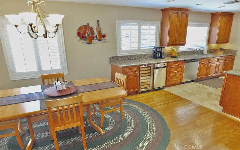 Open-concept view of the dining room and kitchen.