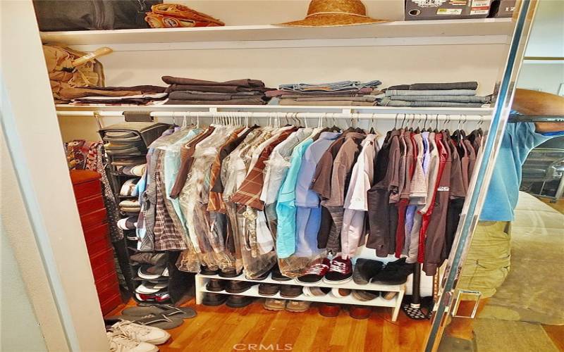 Partial view of the walk-in closet in the primary bedroom