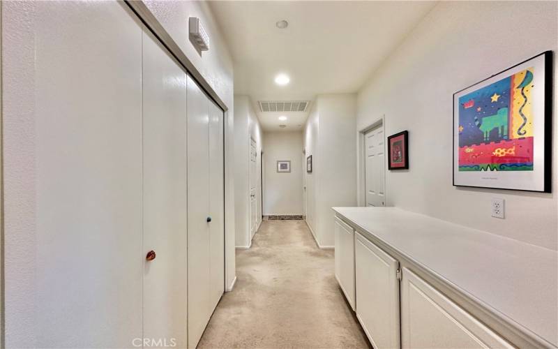 Hallway - Storage Cabinets and Laundry Area