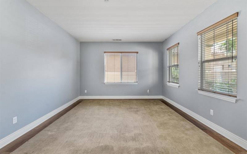 Plenty of options with this lovely room with windows and plenty of natural light shining through