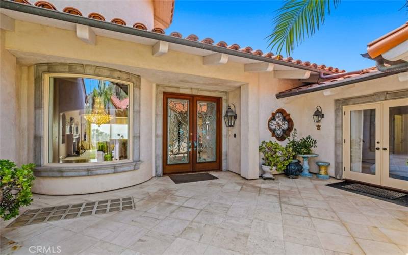 Entrance to this private estate with double entry doors