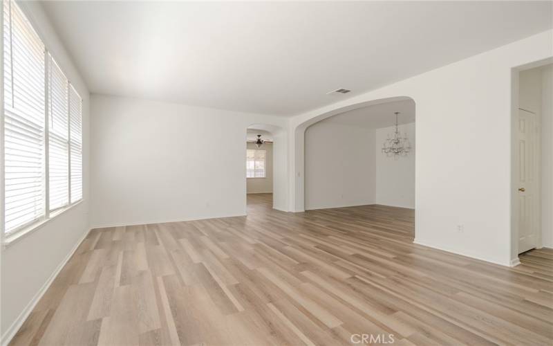 LIVING ROOM. FORMAL DINING TO THE RIGHT.