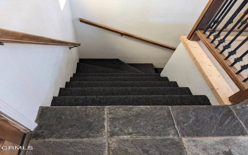 Looking down staircase to lower level