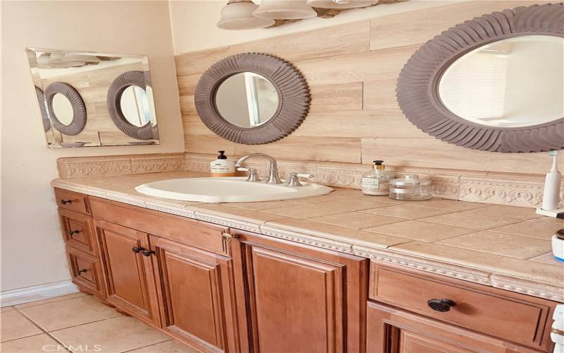 Tile counters in bathroom.