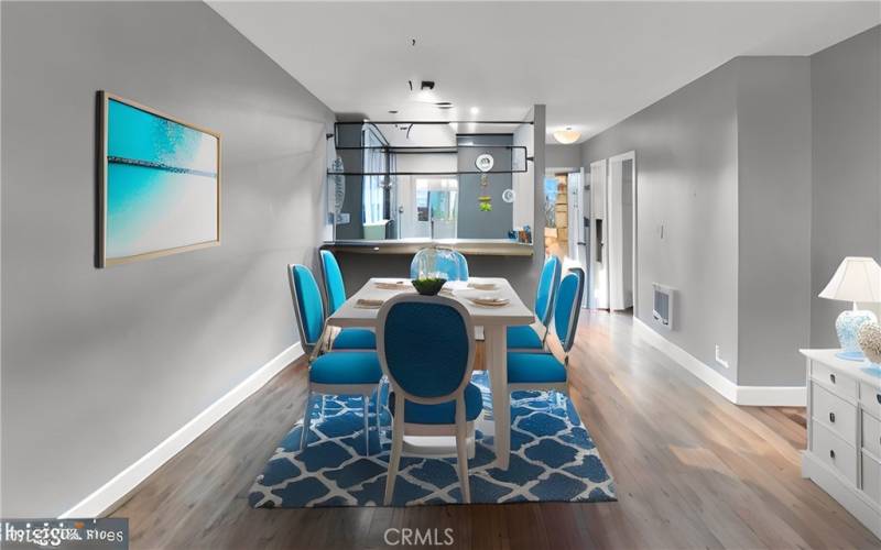 Dining room to kitchen staged