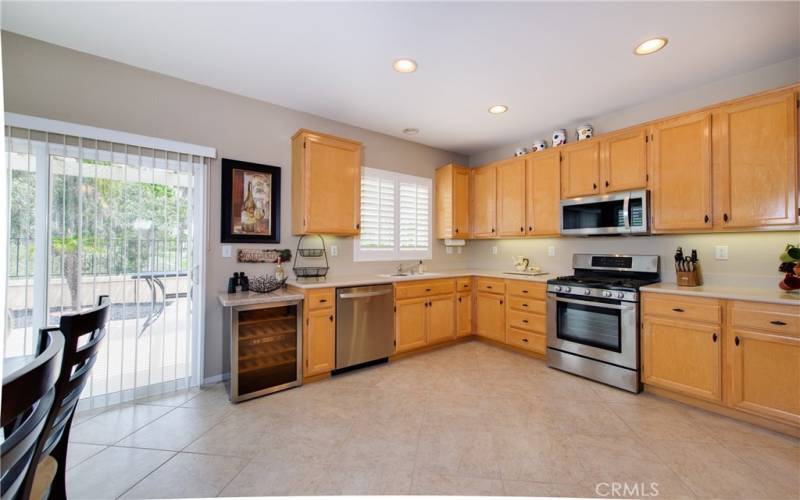 Fabulous open view kitchen. Premium stainless steel appliances. Cabinets galore. Wine refrigerator.