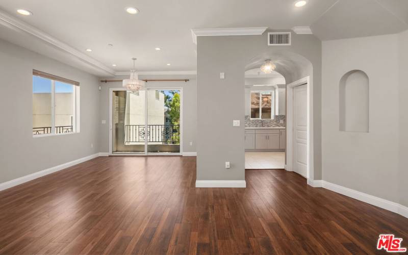 Dining and kitchen. Powder room on left