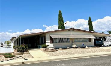 Beautiful triple wide 2bd/2ba w/Covered patio and covered carport. OWN your OWN land!