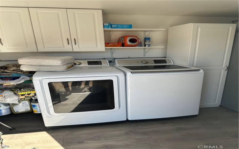 Washer & dryer in storage building.