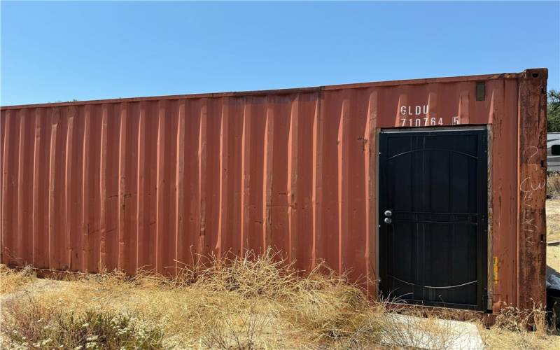 Double cargo container storage on parcel.