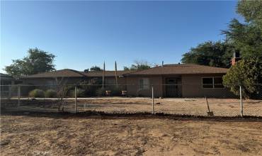 Front of unit and front fenced​​‌​​​​‌​​‌‌​​‌​​​‌‌​​​‌​​‌‌​​‌‌​​‌‌​​​​ yard.