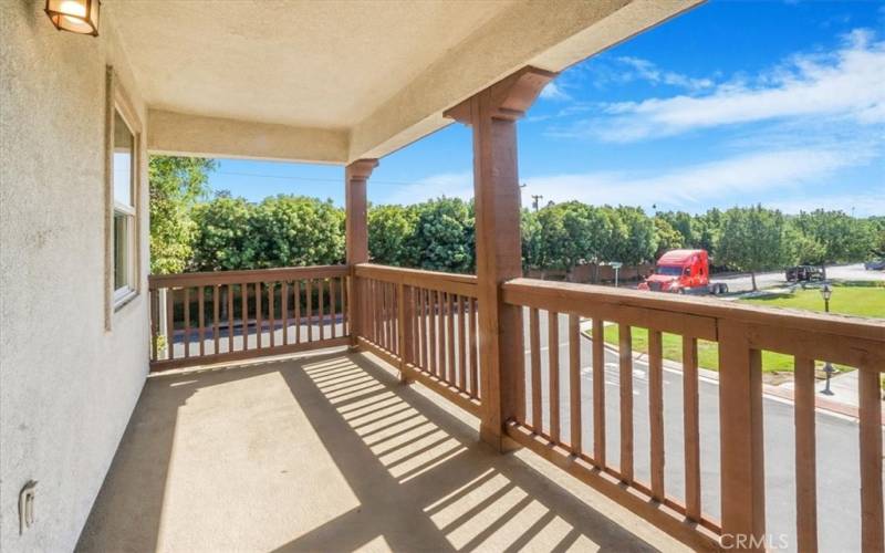 Upstairs balcony. Across street from picturesque green community park.