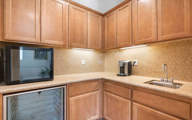 Butler's pantry, wine refrigerator, wet bar just off dining room.