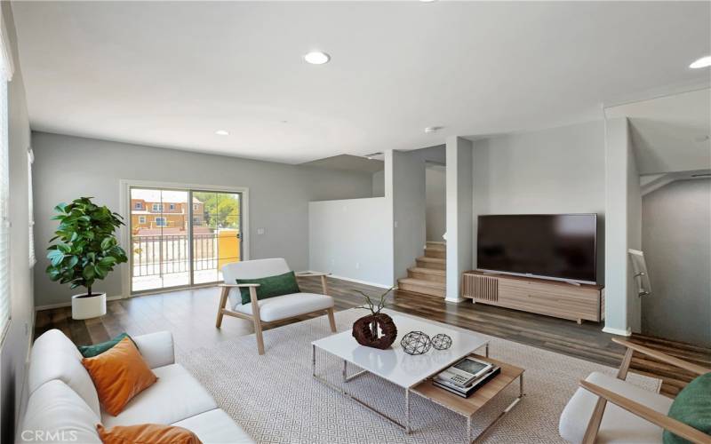 Livingroom with balcony virtually staged