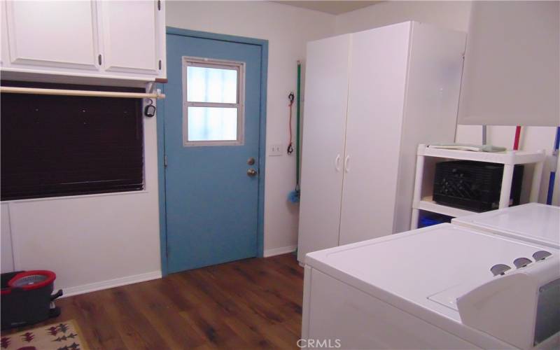 entrance from driveway to large laundry room