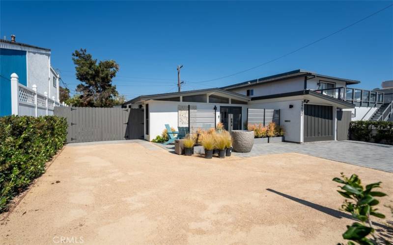 Outside the home facing the entrance