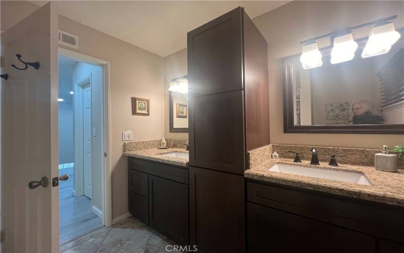 Dual Vanity sinks for shared hallway bath