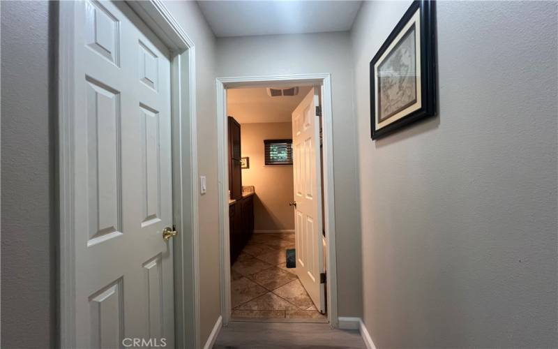 Linen closet and view to shared hallway bath